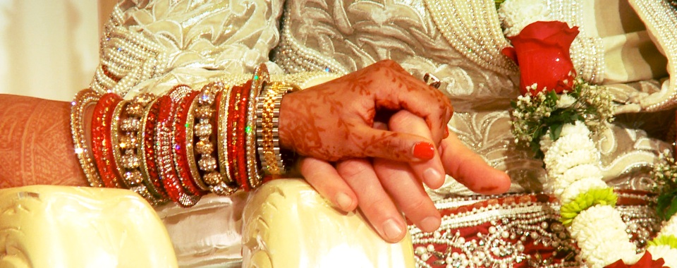 Holding Hands in Indian Wedding Ceremony